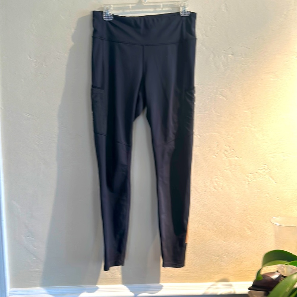 REI leggings with pockets on sides.